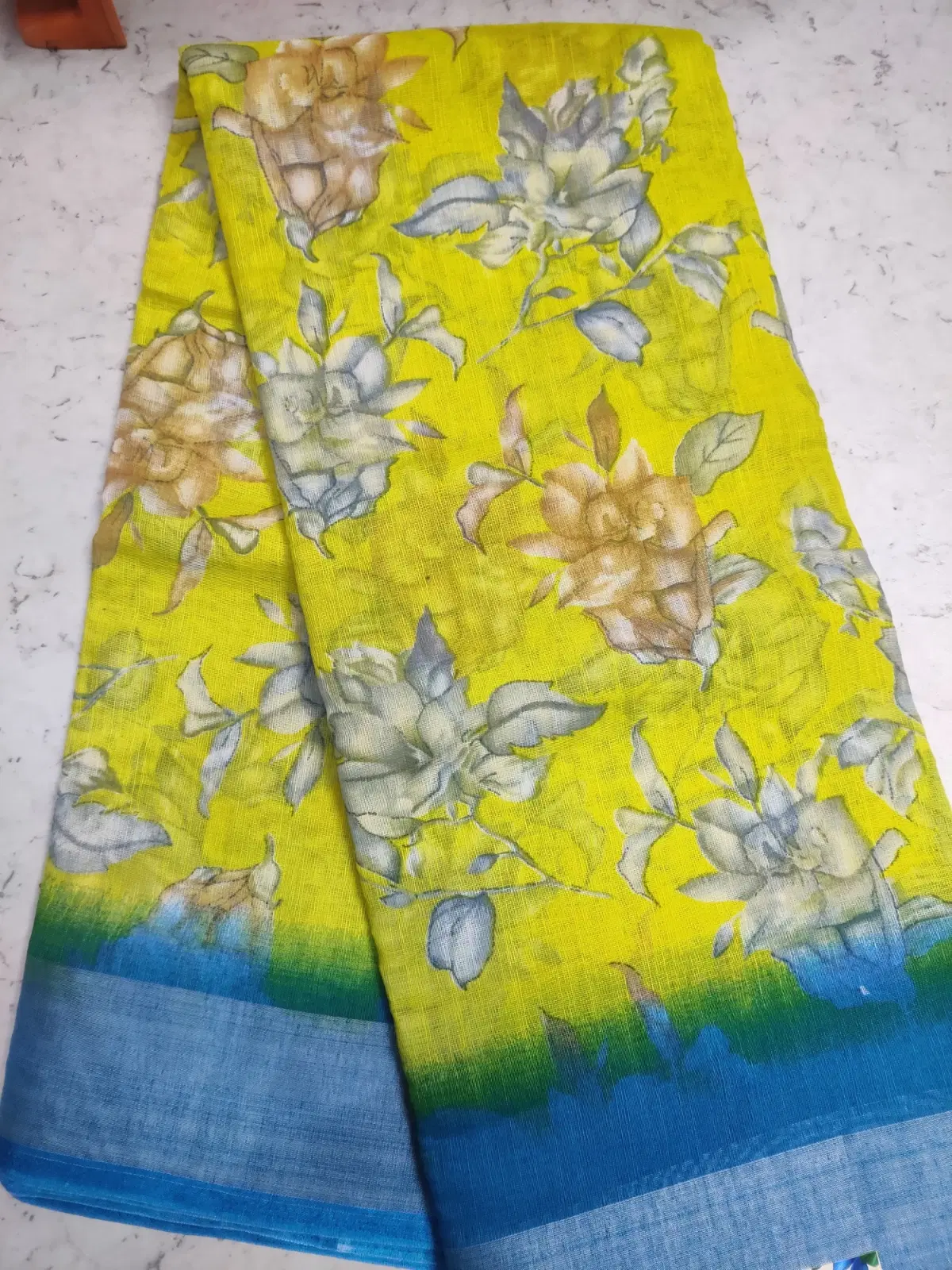 Yellow Floral Printed Saree with Blue Border