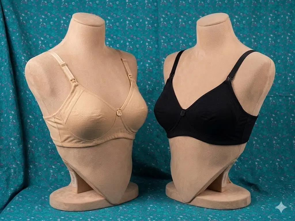 Two women’s nursing bras in beige and black displayed on torso mannequins