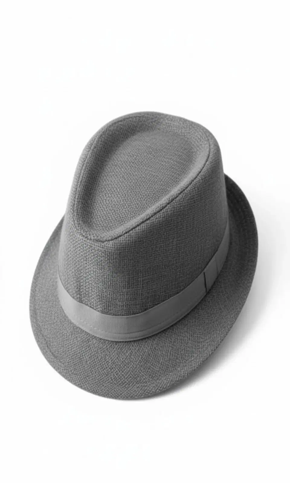 Grey fedora hat with matching band and short brim on a white background