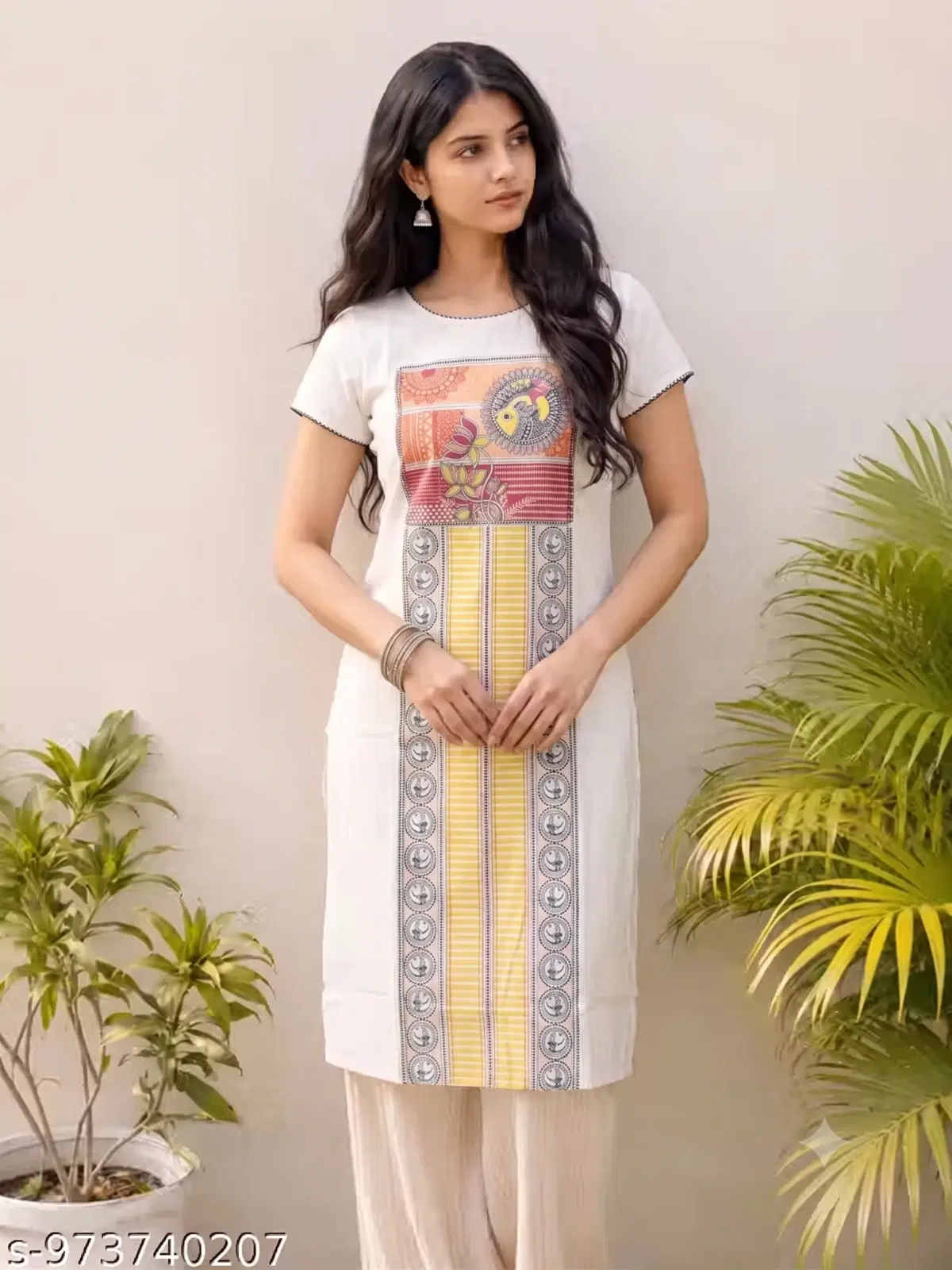 Woman wearing a white straight kurta with multicolor front print and short sleeves