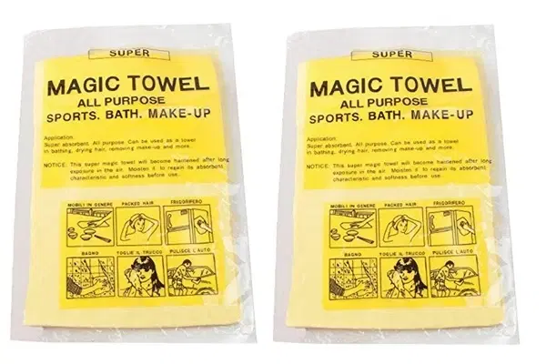 Sealed pack showing yellow Super Magic Towel with usage illustrations on the front label