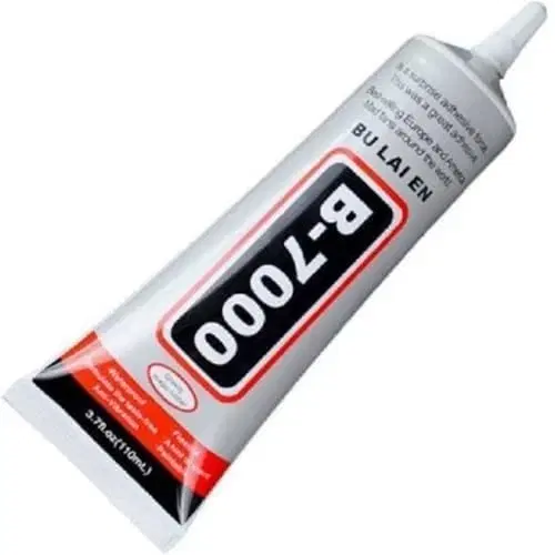 Silver B-7000 glue tube angled on white background with pointed cap and 110ml marking
