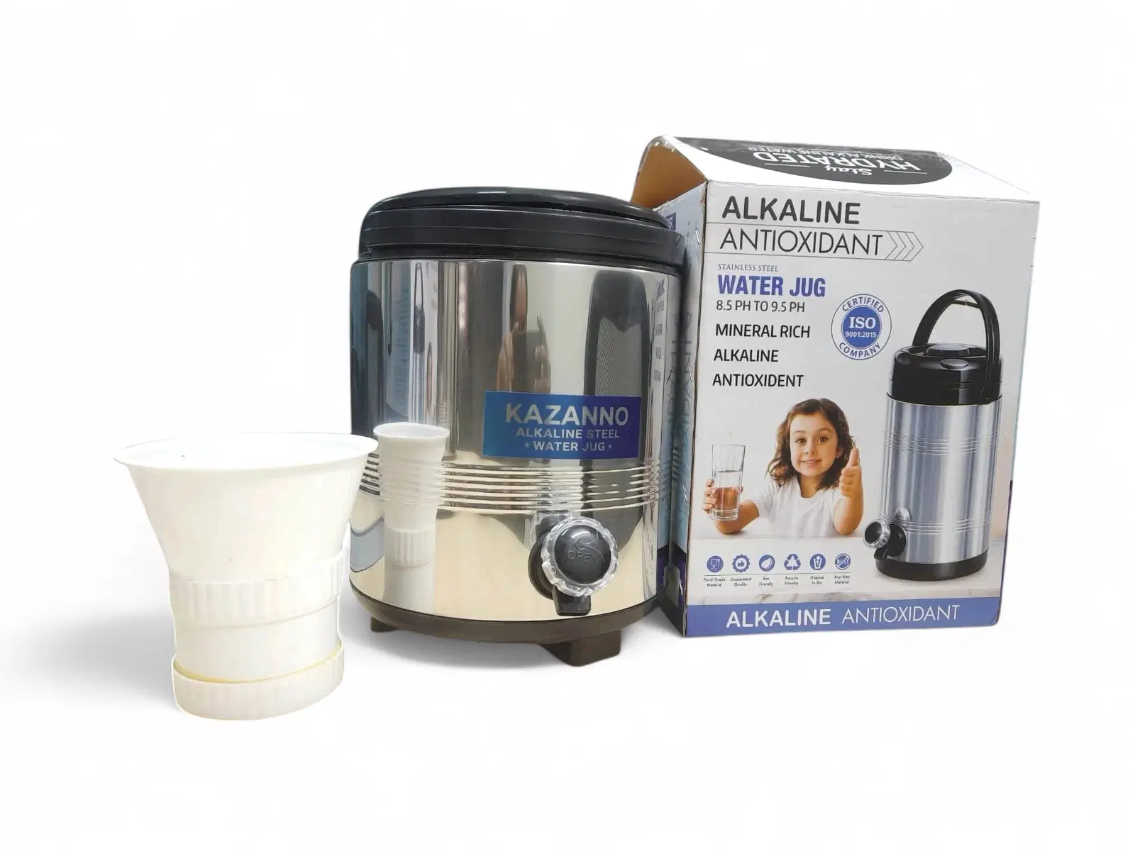 Stainless steel Kazanno water jug with front tap beside its retail box and a white collapsible cup