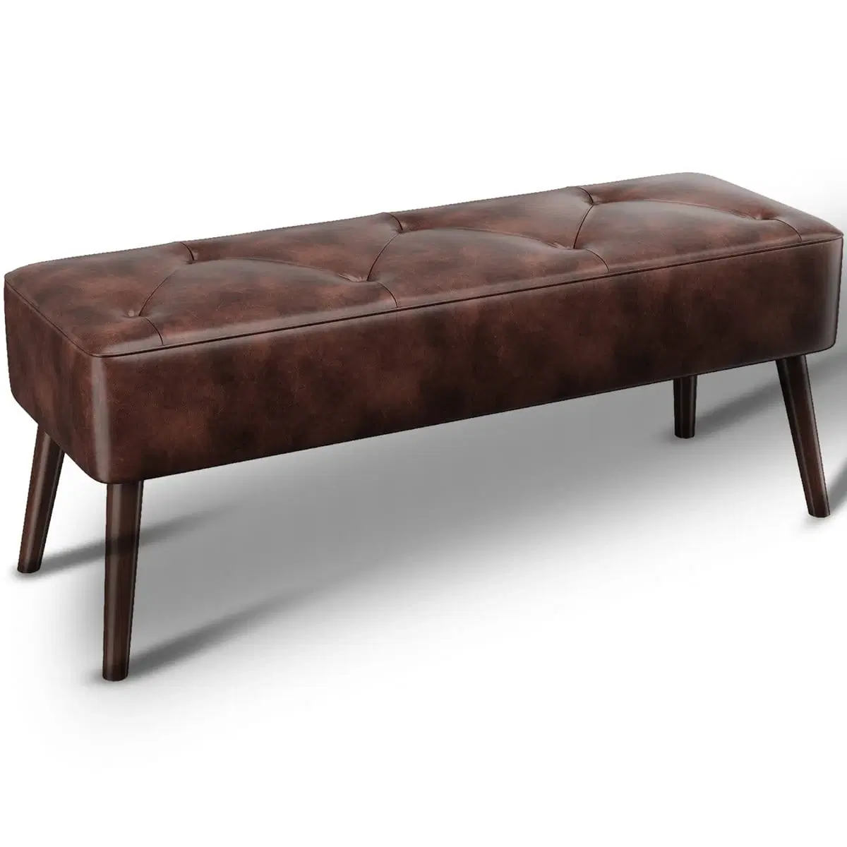 Angled studio view of brown tufted PU leather storage bench with tapered dark wooden legs