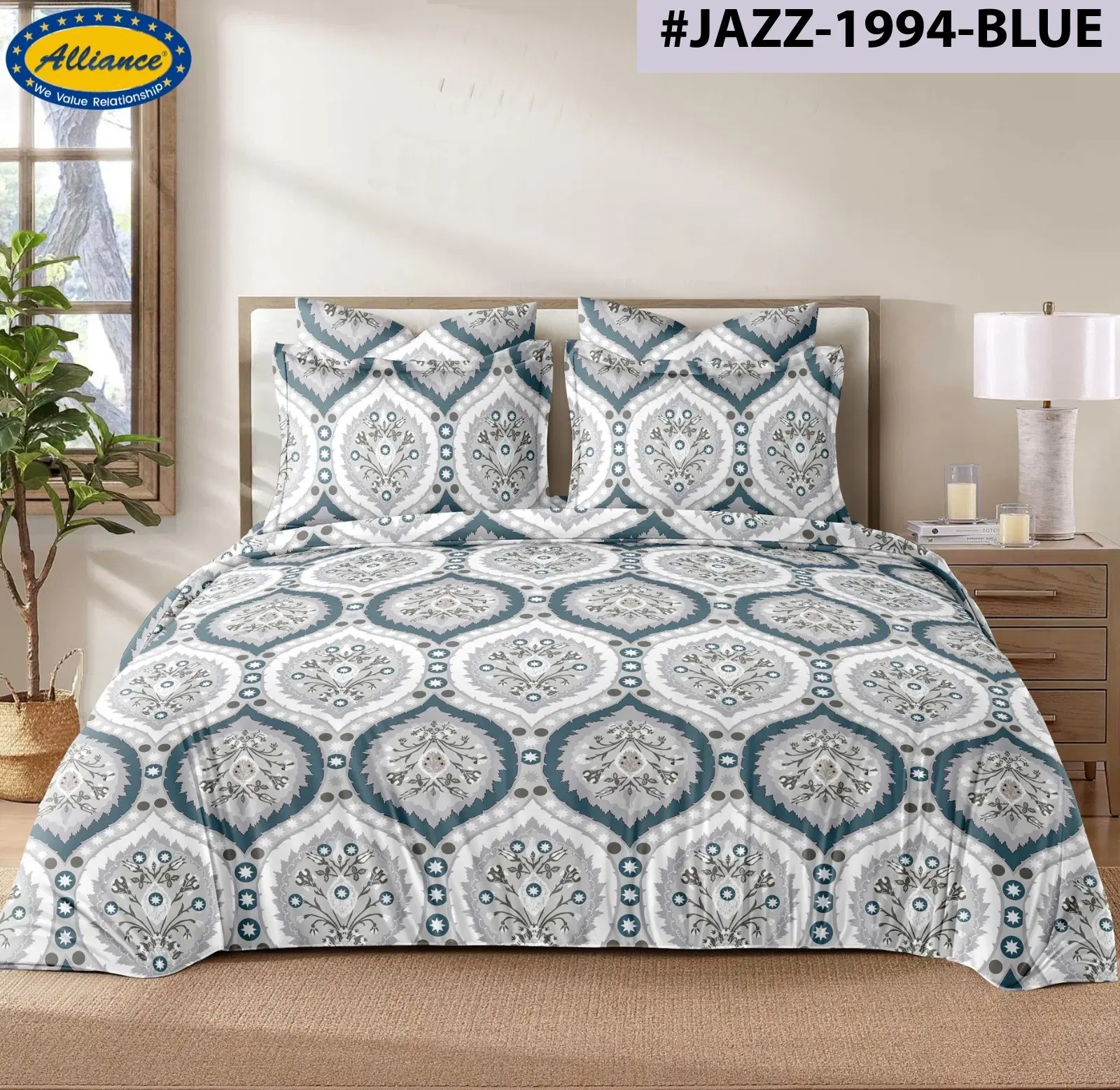 Blue, grey and white medallion print bedsheet set displayed on a bed with matching pillow covers