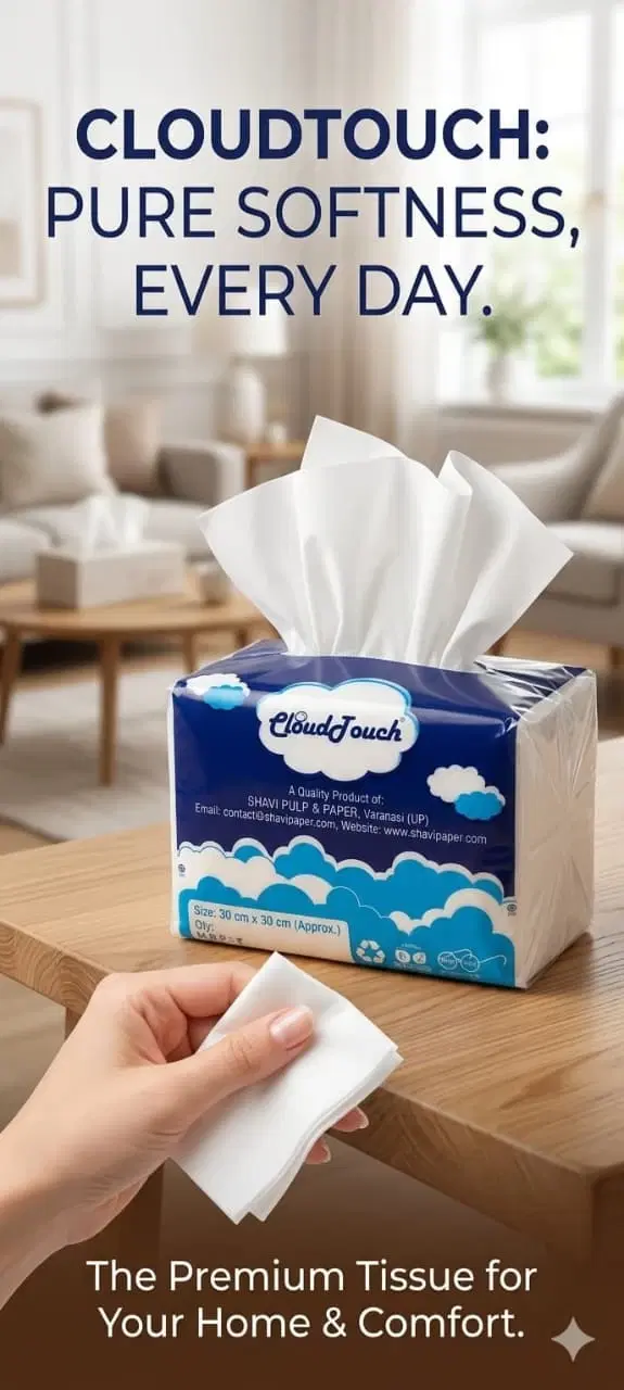 CloudTouch tissue box on a wooden table with tissues pulled up and a hand holding folded white tissues