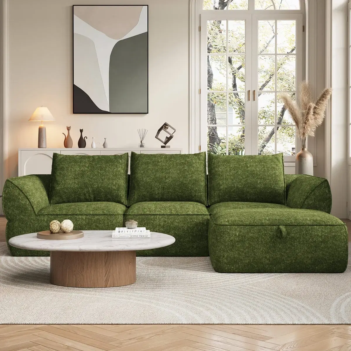 Front view of green modular sofa with ottoman styled in a bright living room