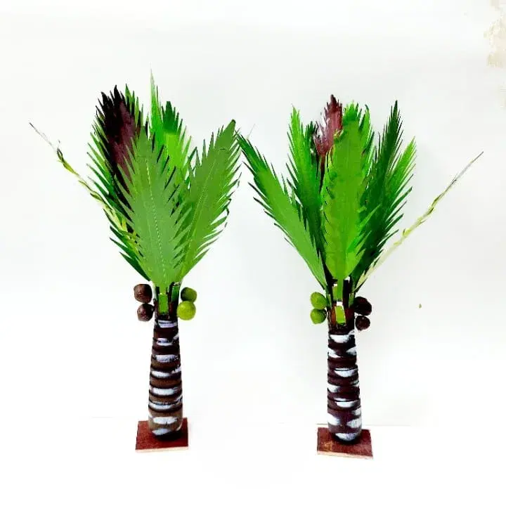 indian artisan hand making wooden coconut tree 1 ft