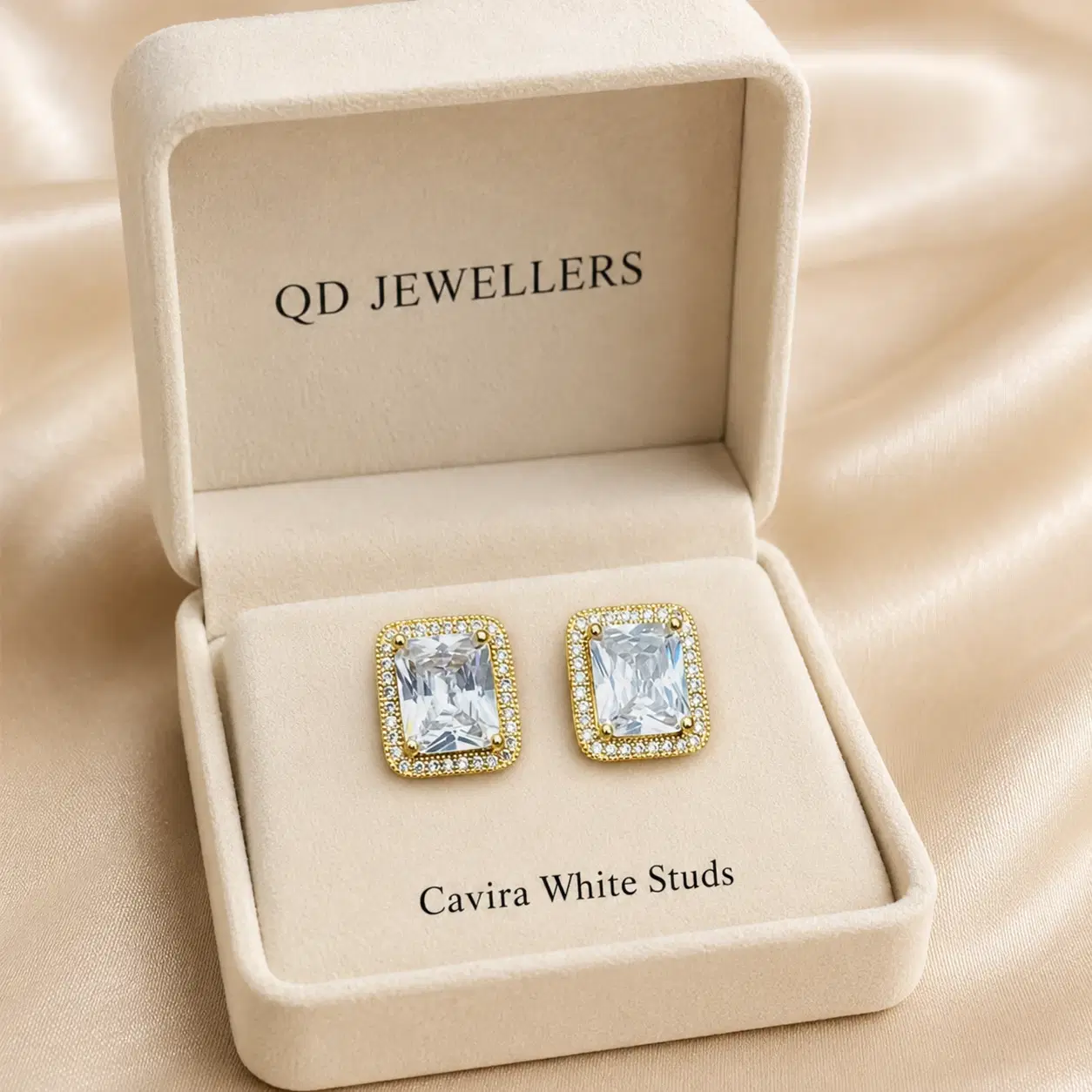 Cavira White Stud Earrings