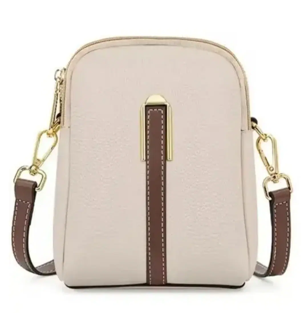 Shop the women’s beige compact crossbody sling bag. Stylish, lightweight, and perfect for carrying daily essentials hands-free.
