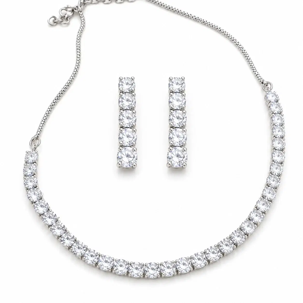 Silver-tone tennis necklace with clear stone detailing and matching vertical stud earrings